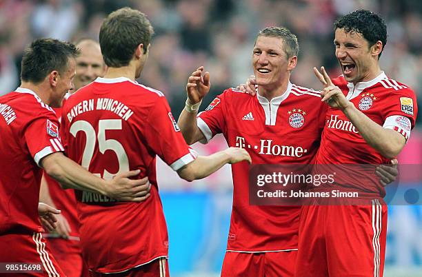 Thomas Mueller of Bayern celebrates with his team mates Ivica Olic, Arjen Robben, Bastian Schweinsteiger and Mark van Bommel after scoring his team's...