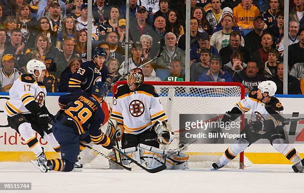 Jason Pominville of the Buffalo Sabres scores a second period goal against Tuukka Rask and Andrew Ference of the Boston Bruins in Game Two of the...