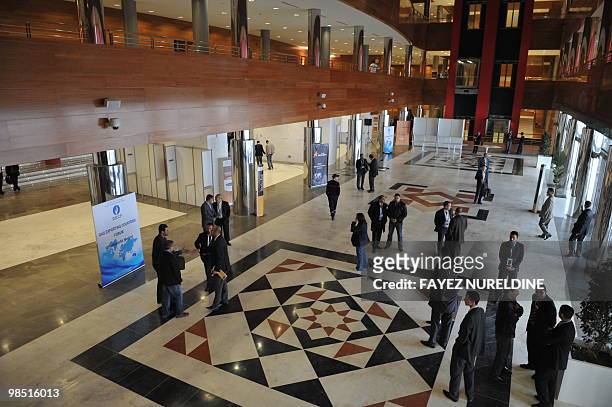 Algerian and foreigners are seen at the Oran Convention Centre that hosts the Gaz Exporting Countries Forum in Oran 400kms west of Algiers on April...