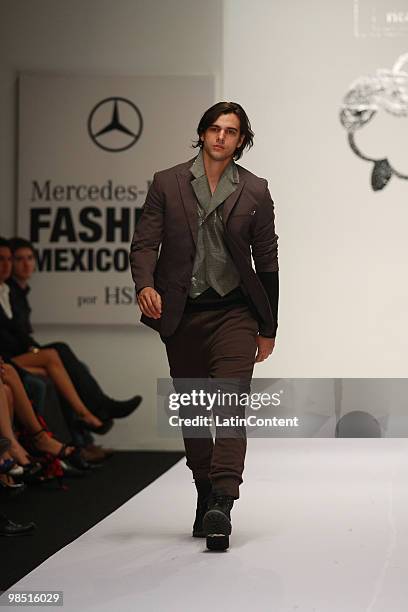 Model displays a design of Ricardo Seco during the Mercedes-Benz Fashion Week 2010 at Campo Marte on April 16, 2010 in Mexico City, Mexico.