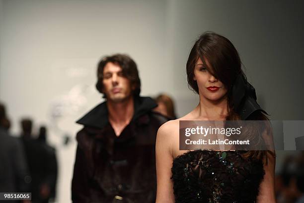 Model displays a design of Ricardo Seco during the Mercedes-Benz Fashion Week 2010 at Campo Marte on April 16, 2010 in Mexico City, Mexico.