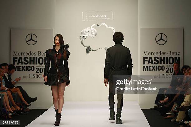 Model displays a design of Ricardo Seco during the Mercedes-Benz Fashion Week 2010 at Campo Marte on April 16, 2010 in Mexico City, Mexico.