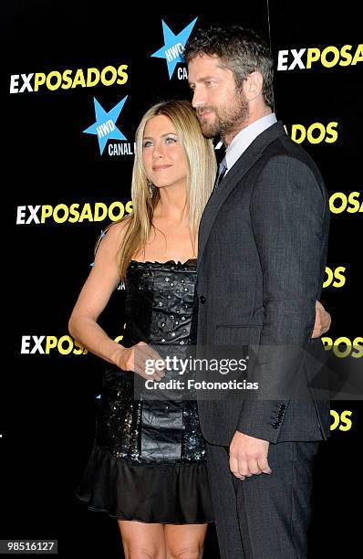 Actress Jennifer Aniston and actor Gerard Butler attend the premiere of "The Bounty Hunter" at Callao Cinema on March 30, 2010 in Madrid, Spain.