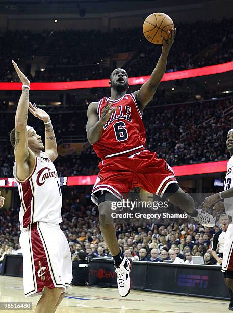 Ronald Murray of the Chicago Bulls gets a shot off next to Delonte West of the Cleveland Cavaliers in Game One of the Eastern Conference...