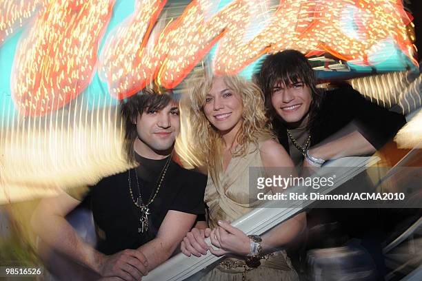 Musicians Neil Perry, Kimberly Perry and Reid Perry of The Band Perry pose at the 45th Annual Academy of Country Music Awards concerts at the Fremont...
