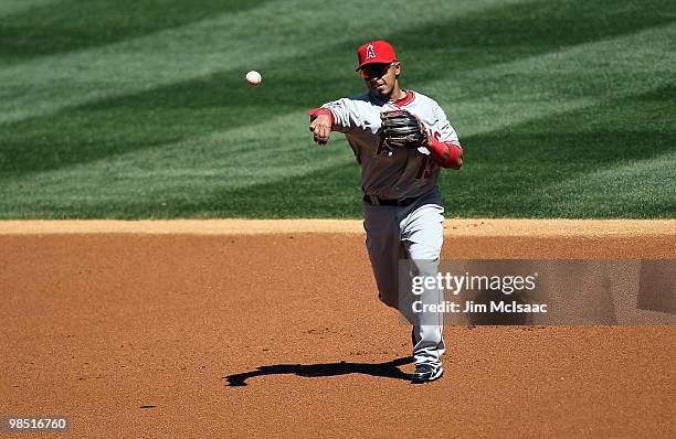 Maicer Izturis of the Los Angeles Angels throws against the New York Yankees of Anaheim on April 14, 2010 at Yankee Stadium in the Bronx borough of...
