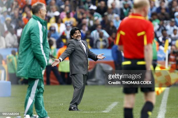 Argentina's coach Diego Maradona gestures near Nigeria's coach Lars Lagerback during their Group B first round 2010 World Cup football match on June...
