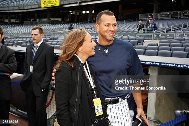 Donna Karan and Yankee Infielder Alex Rodriguez pose for a photo at Yankee Stadium on April 16, 2010 in Bronx borough of New York City.