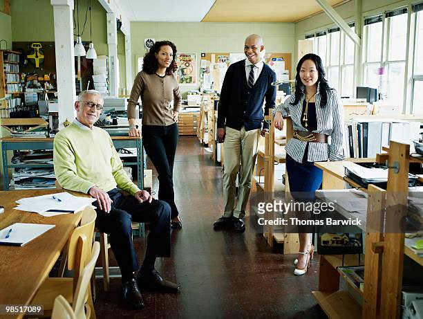 portrait of group of architects in office - leanintogether stock pictures, royalty-free photos & images