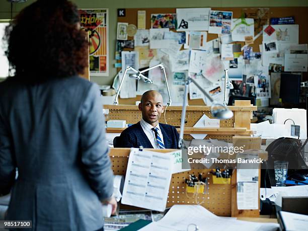 two colleague in discussion in office - newbusiness stock pictures, royalty-free photos & images