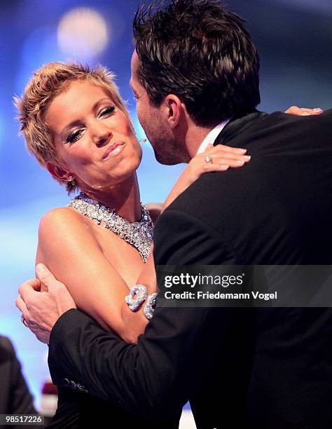 Sylvie van der Vaart kisses Lothar Matthaeus during the contest 'DSDS - Deutschland Sucht Den Superstar' final show on April 17, 2010 in Cologne,...