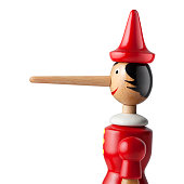 Lie. Pinocchio with a long nose on white background.