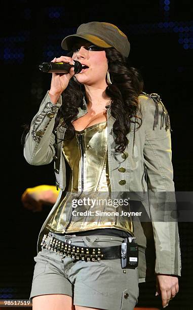 Tula 'Tulisa' Contostavlos of N-Dubz performs live at Hammersmith Apollo on April 17, 2010 in London, England.