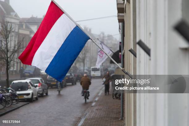 Dutch flag hanging from a house facade in the Dutch town Sneek in the Netherlands, 26 January 2018. The nearby city Leeuwarden in the Frisian...