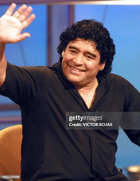 Soccer legend Diego Armando Maradona attends the television program which will feature the World Cup in Santiago, Chile, 23 May 2002. AFP...