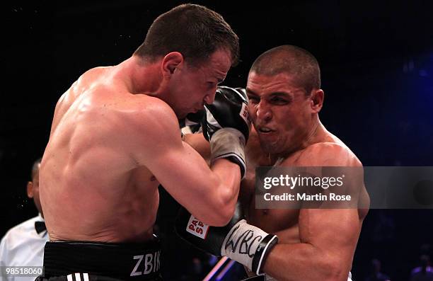 Sebastian Zbik of Germany exchanges punches with Domenico Spada of Italy during the WBC middleweight interim world championship fight during the...