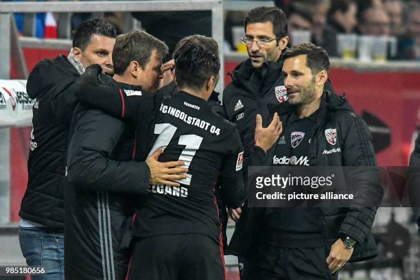Ingolstadt's Darío Lezcano celebrates with Ingolstadt's coach Stefan Leitl after his penalty shoot 0-2 goal during the German 2nd division Bundesliga...