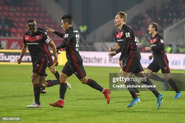 Ingolstadt's Darío Lezcano celebrates after his 0-2 goal during a penalty shoot at the German 2nd division Bundesliga soccer match between Jahn...