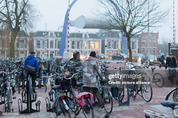 Closely parked bicycles standing in Leeuwarden, Netherlands, 26 January 2018. Leeuwarden in the Frisian province is the Capital of Culture 2018....
