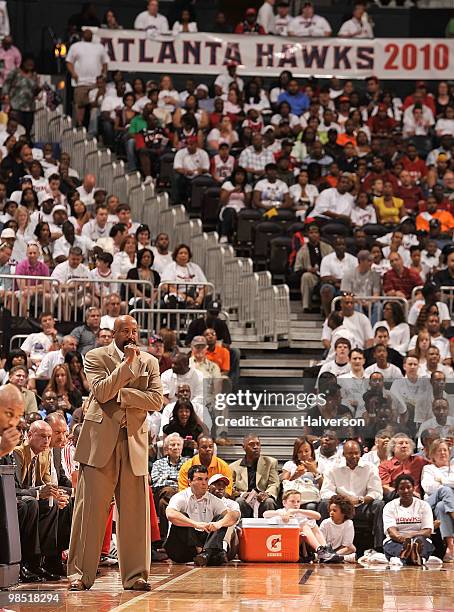 Head coach Mike Woodson of the Atlanta Hawks watches his team play against the Milwaukee Bucks during Game One of the Eastern Conference...