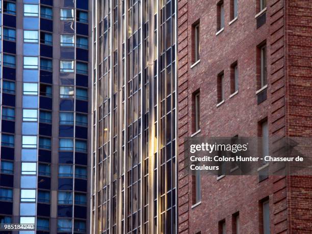 three building facades in manhattan - chasseur stock pictures, royalty-free photos & images