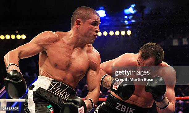 Sebastian Zbik of Germany exchanges punches with Domenico Spada of Italy during the WBC middleweight interim world championship fight during the...