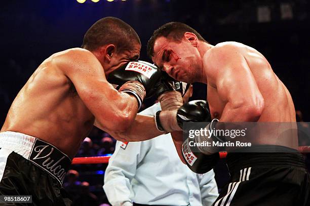 Sebastian Zbik of Germany exchanges punches with Domenico Spada of Italy during the WBC middleweight interim world championship fight during the...