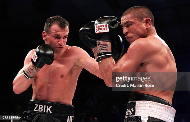 Sebastian Zbik of Germany exchanges punches with Domenico Spada of Italy during the WBC middleweight interim world championship fight during the...