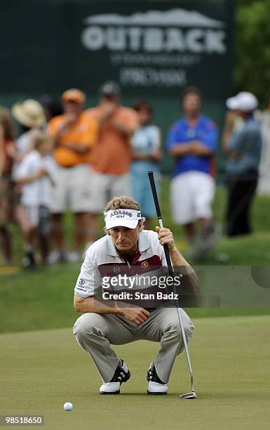 Bernhard Langer checks his putt on the 18th green during the second round of the Outback Steakhouse Pro-Am at TPC Tampa Bay on April 17, 2010 in...