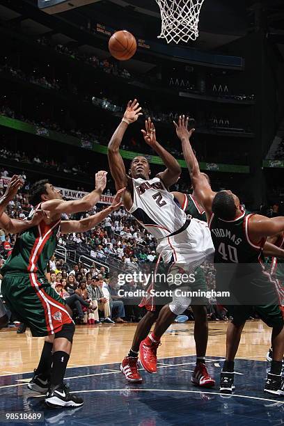 Joe Johnson of the Atlanta Hawks puts up an off-balance shot against the Milwaukee Bucks in Game One of the Eastern Conference Quarterfinals during...