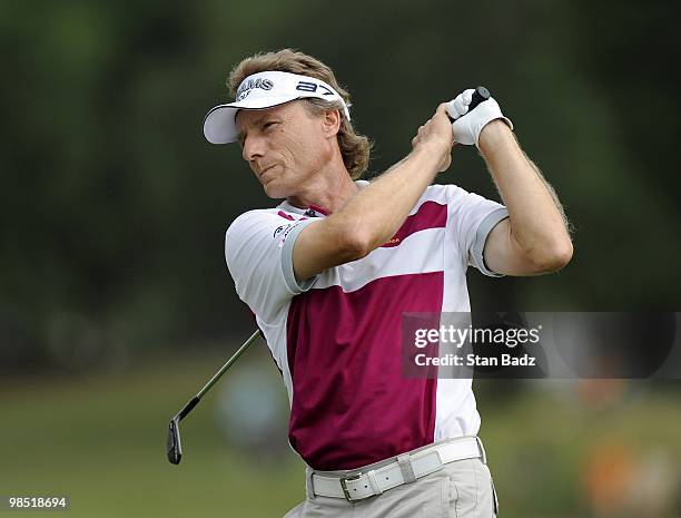 Bernhard Langer hits to the 18th green during the second round of the Outback Steakhouse Pro-Am at TPC Tampa Bay on April 17, 2010 in Lutz, Florida.