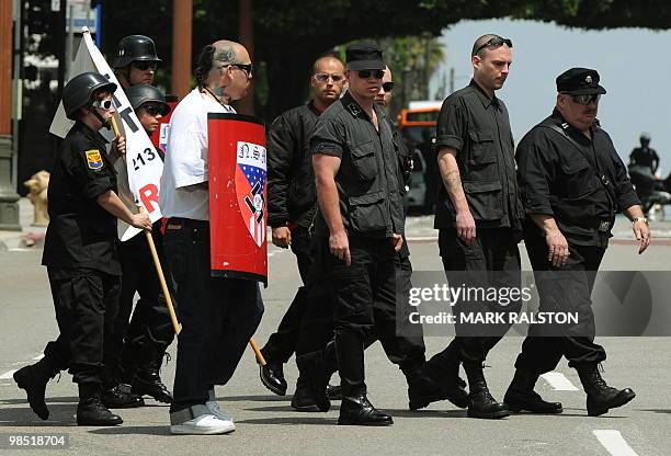 Members of the Neo-Nazi group, The American National Socialist Movement arrive to hold a rally in front of the Los Angeles City Hall, on April 17,...