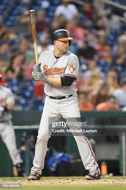 Mark Trumbo of the Baltimore Orioles prepares for a pitch during a baseball game against the Washington Nationals at Nationals Park on June 20, 2018...