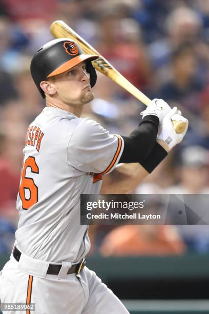 Caleb Joseph of the Baltimore Orioles takes a swing during a baseball game against the Washington Nationals at Nationals Park on June 20, 2018 in...