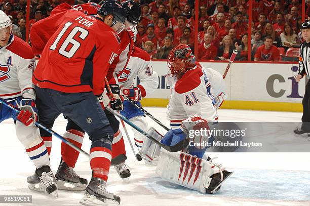 Jaroslav Halek of the Montreal Canadiens makes a save against a Eric Fehr of the Washington Capitals shot during Game Two of the Eastern Conference...