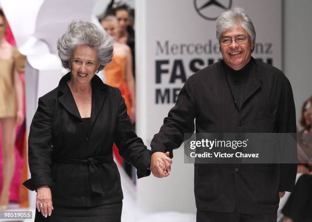 Fashion designers Maria Luisa De Chavez and sculptor Sebastian walk the runway during Mercedes-Benz Fashion Mexico Autumn Winter 2010 at Campo Marte...