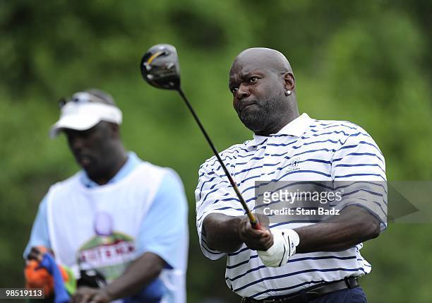 Pro Football Hall of Fame Emmitt Smith hits to the 16th green during the second round of the Outback Steakhouse Pro-Am at TPC Tampa Bay on April 17,...