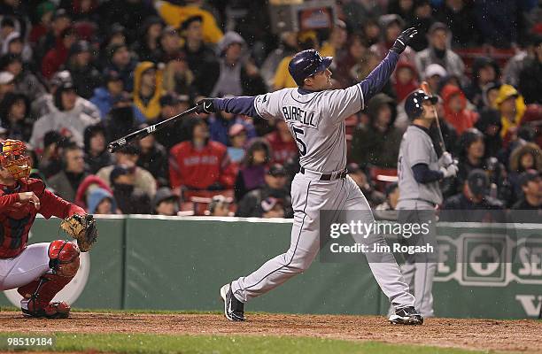 Pat Burrell of the Tampa Bay Rays hits a home run in extra innings against the Boston Red Sox at Fenway Park on April 17, 2010 in Boston,...