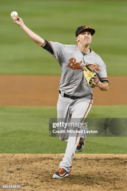 Brad Brach of the Baltimore Orioles pitches during a baseball game against the Washington Nationals at Nationals Park on June 20, 2018 in Washington,...