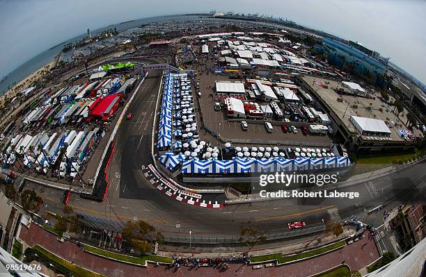 Dario Franchitti of Scotland driver of the Target Chip Ganassi Racing Dallara Honda leads his teammate Scott Dixon of New Zealand during qualifying...