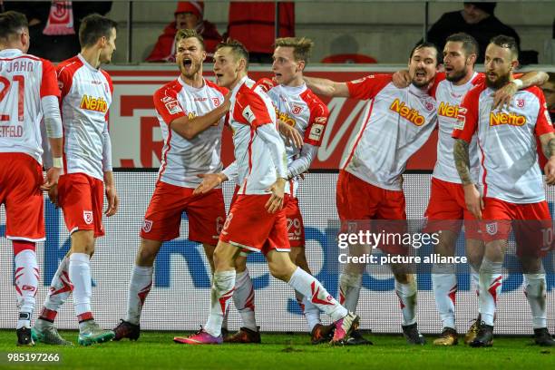 Regensburg's team celebrates the 3-2 goal during the German 2nd division Bundesliga soccer match between Jahn Regensburg and FC Ingolstadt 04 in the...