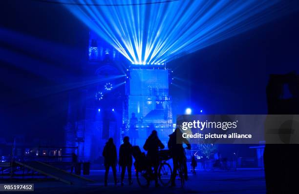 Passerbys stand in front of a light installation in Leeuwarden, Netherlands, 26 January 2018. Leeuwarden in the Frisian province is the Capital of...