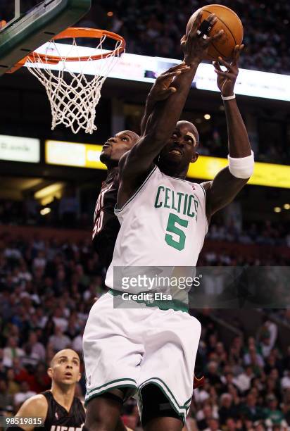 Kevin Garnett of the Boston Celtics is fouled by Joel Anthony of the Miami Heat during Game One of the Eastern Conference Quarterfinals of the 2010...
