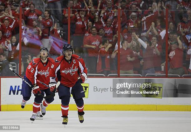 Alex Ovechkin of the Washington Capitals celebrates a second period goal by Nicklas Backstrom against the Montreal Canadiens in Game Two of the...