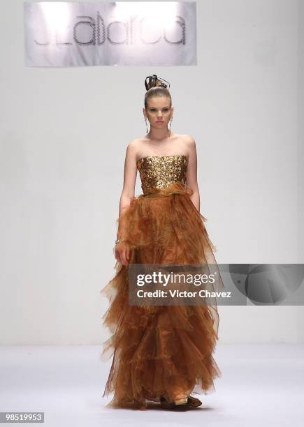 Model walks the runway wearing Jose Louis Abarca during Mercedes-Benz Fashion Mexico Autumn Winter 2010 at Campo Marte on April 15, 2010 in Mexico...