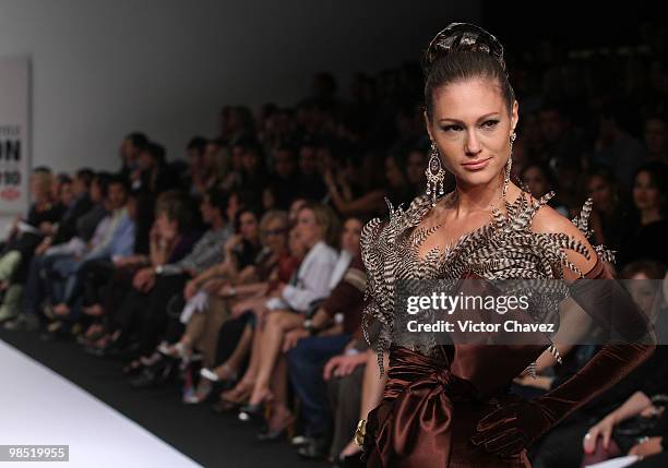 Model walks the runway wearing Jose Louis Abarca during Mercedes-Benz Fashion Mexico Autumn Winter 2010 at Campo Marte on April 15, 2010 in Mexico...