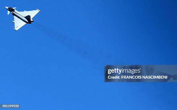 French army Rafale fighter jet participates on June 26 during military manoeuvres at the Combined Armed Forces Shooting Training Center in Suippes,...