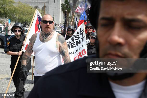 Members of the National Socialist Movement leave after their rally near City Hall on April 17, 2010 in Los Angeles, California. An NSM anti-illegal...