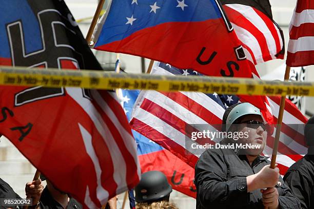 Members of the National Socialist Movement rally near City Hall on April 17, 2010 in Los Angeles, California. An NSM anti-illegal immigration rally...