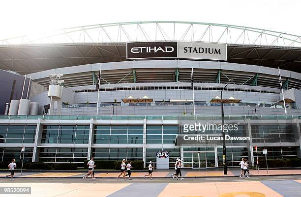 Participants runs past Eithad Stadium during the Dow Live Earth Run for Water at The Docklands on April 18, 2010 in Melbourne, Australia.
